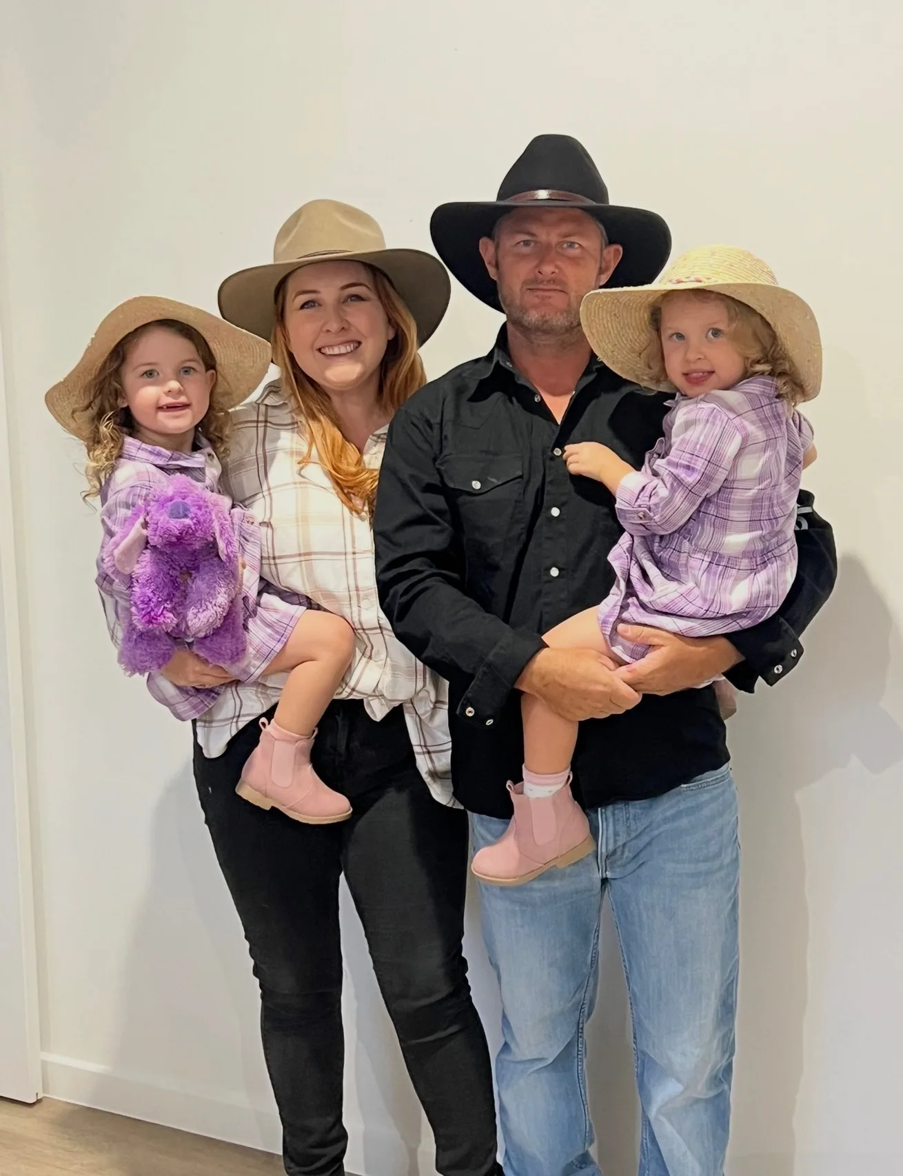 Image of mum, dad and twin daughters