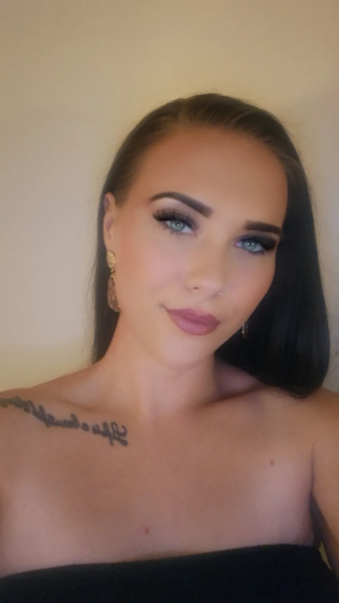 selfie of woman in black top