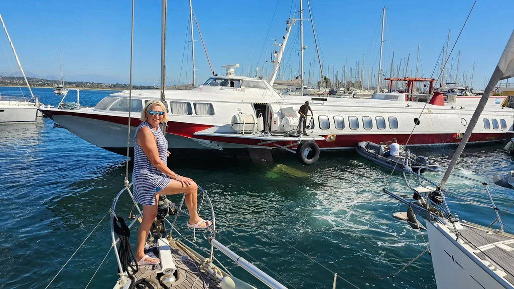 Image of woman standing on boat