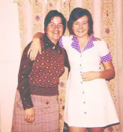 two young women arm in arm