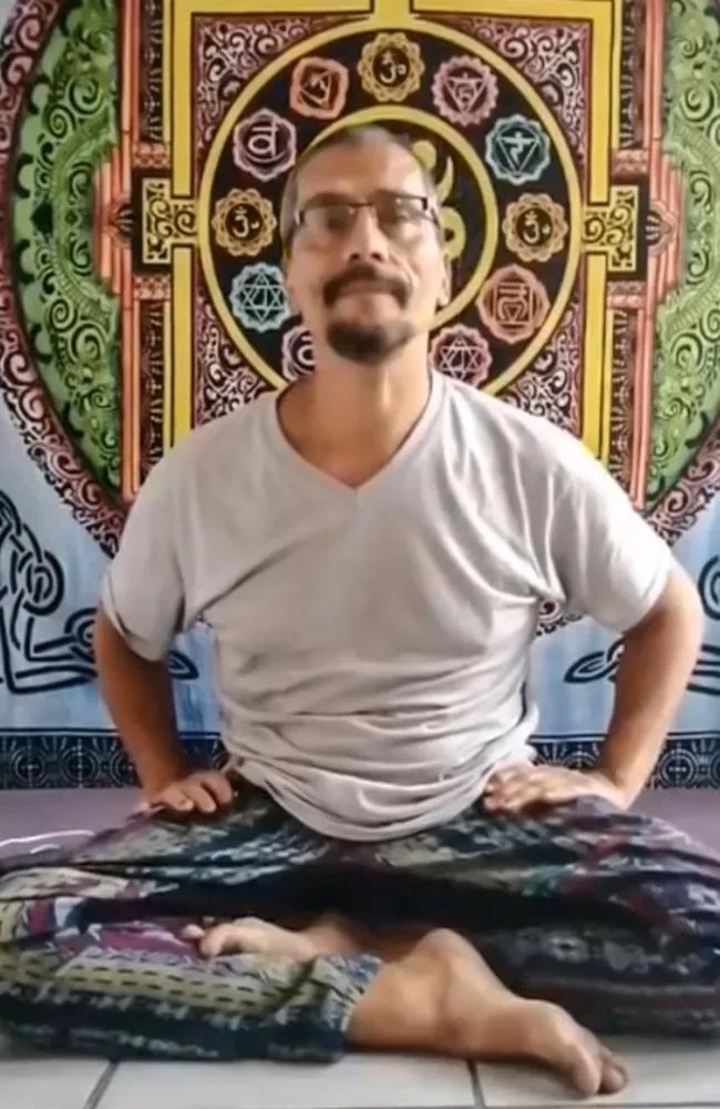 man doing yoga