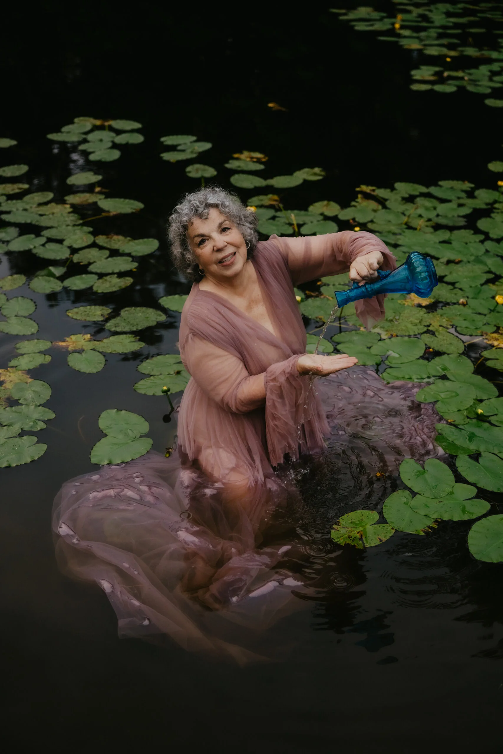 Natalie in a lily pond