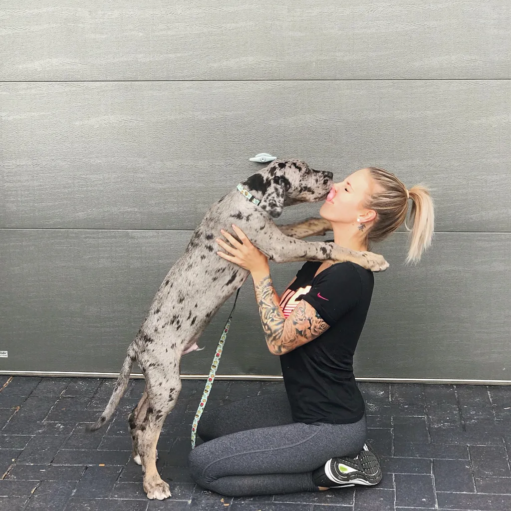 Hugo as a puppy with Sarah