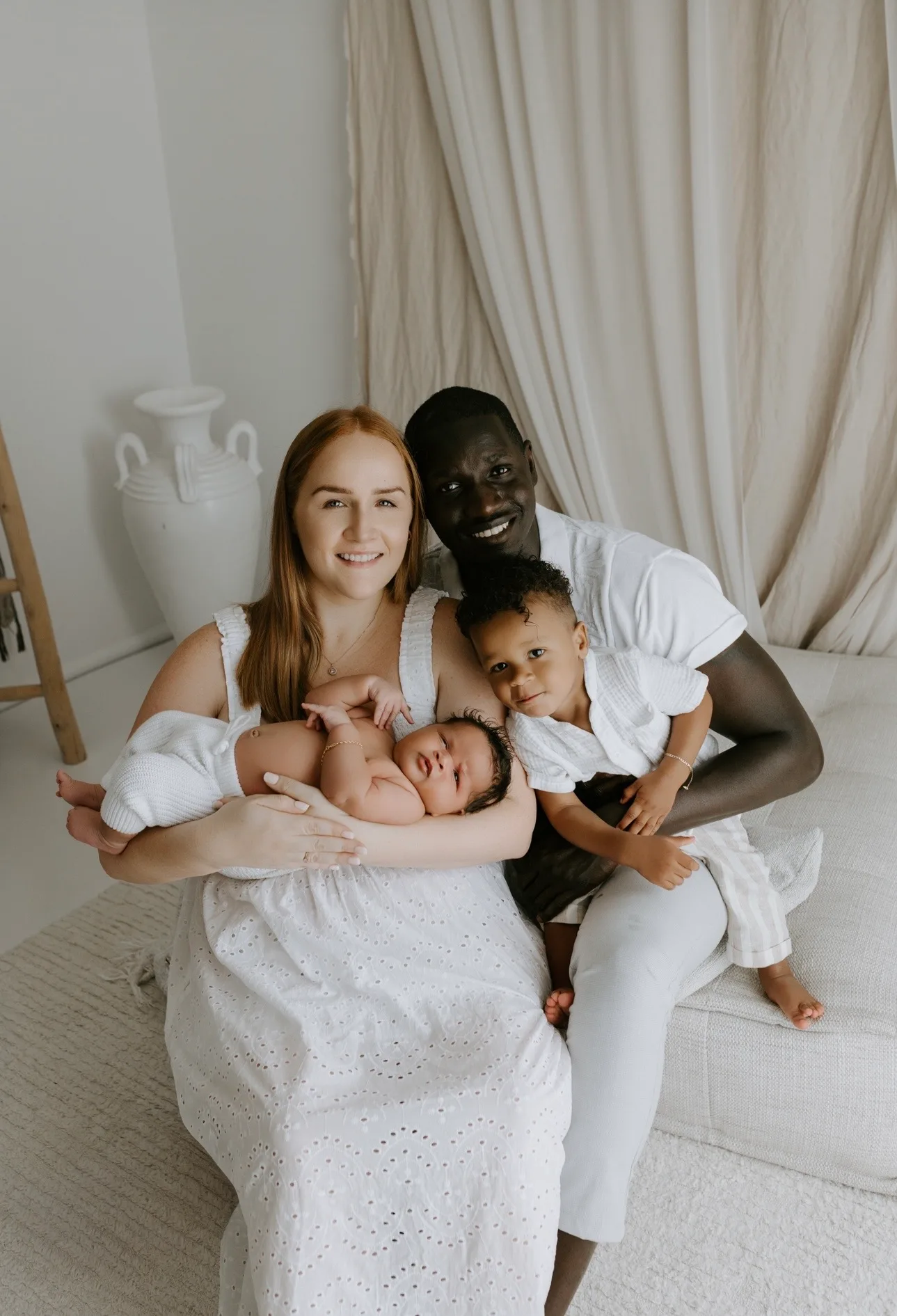 Image of mum, dad and two sons