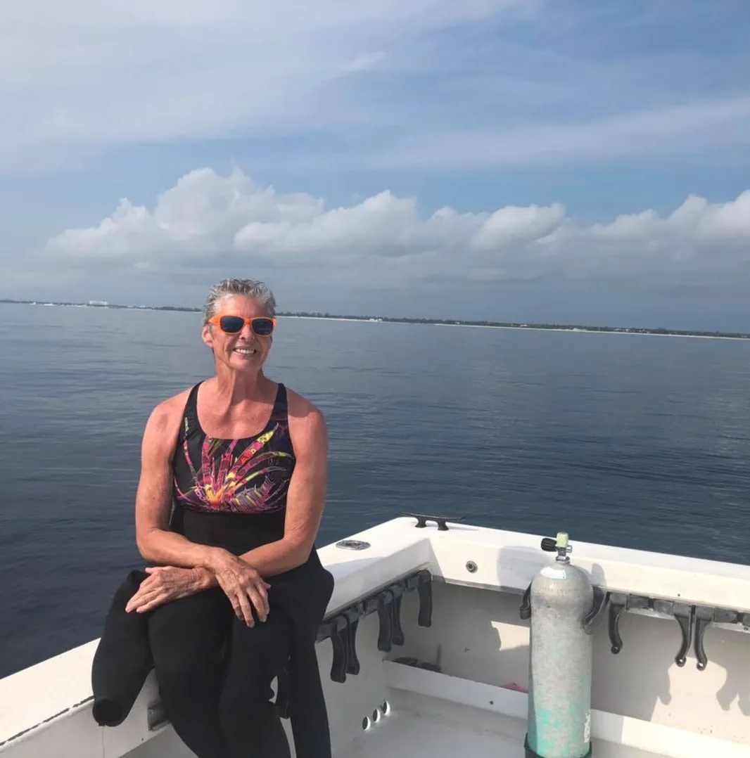 Image of woman sitting on a boat