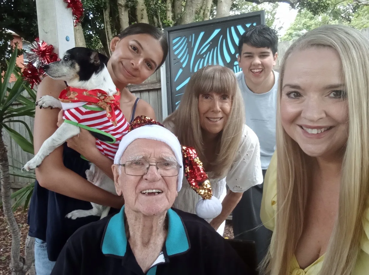 family selfie outside 