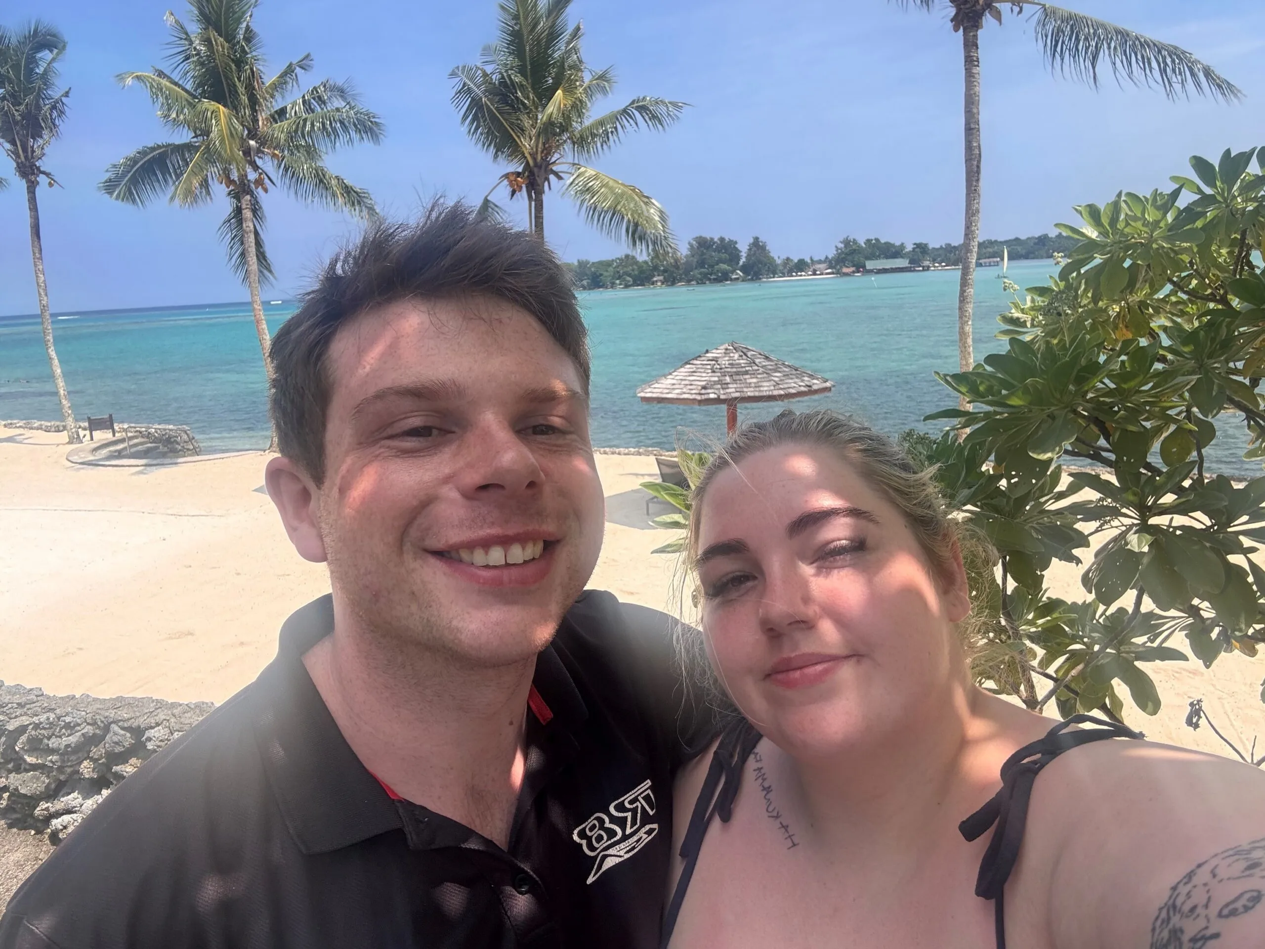 man and woman on tropical island