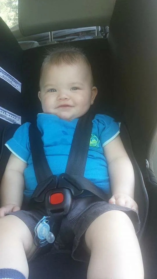 baby in blue t-shirt