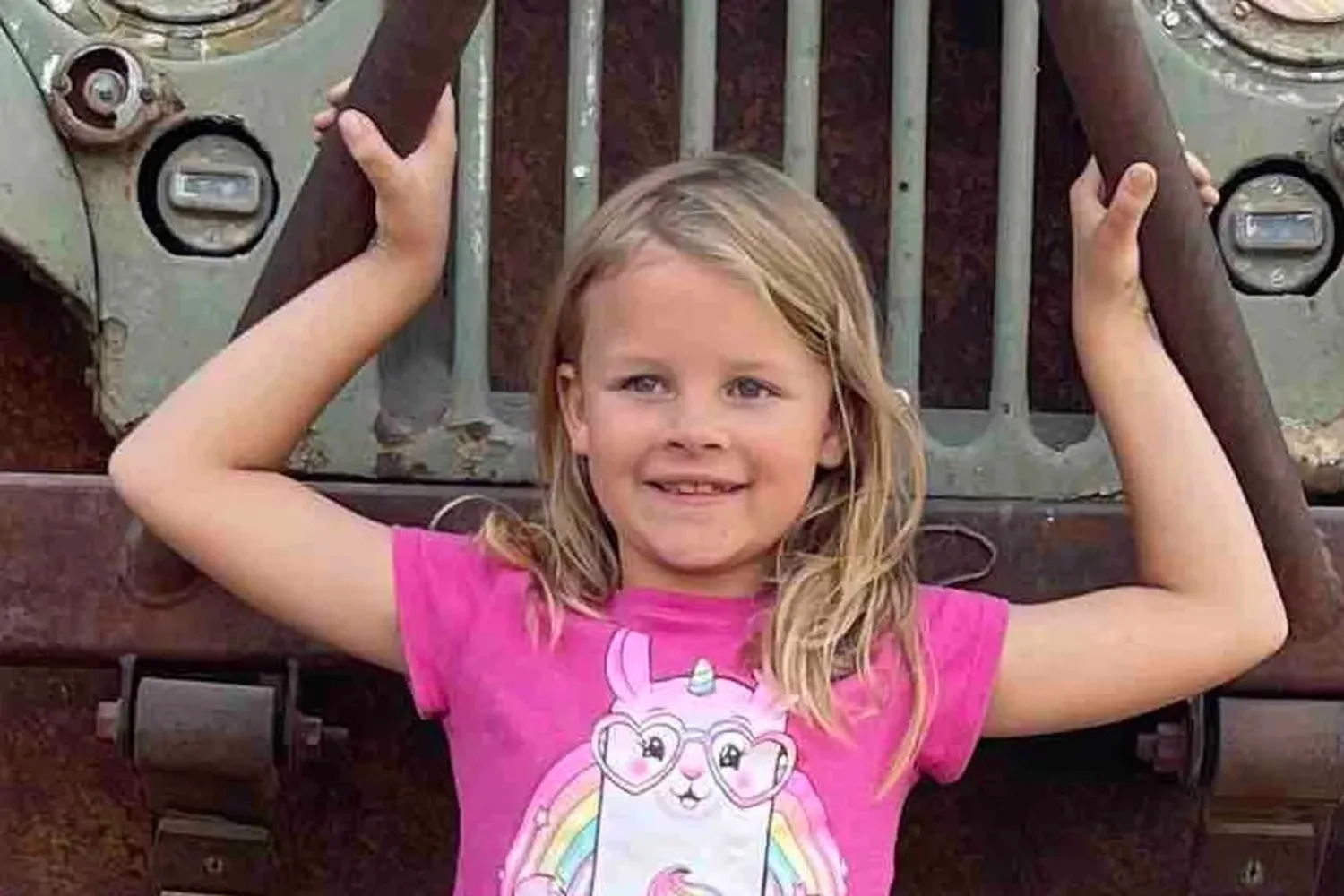Little girl in pink top with unicorn on it. Murder victim Athena Strand