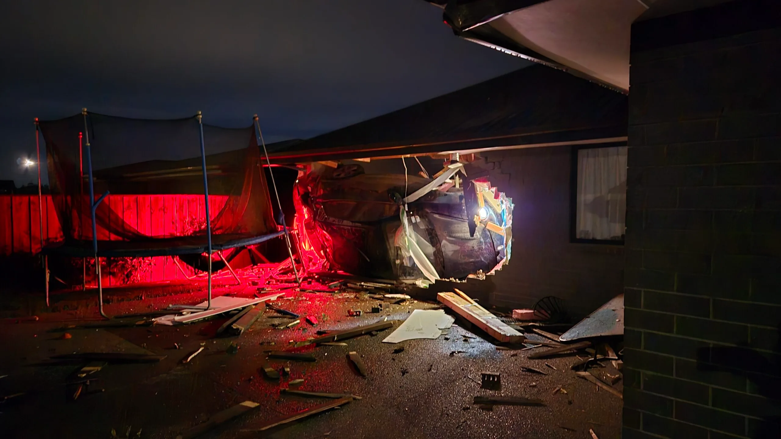 the car stuck in the house at night