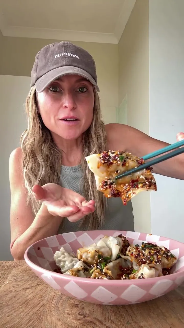 woman showing off dumplings