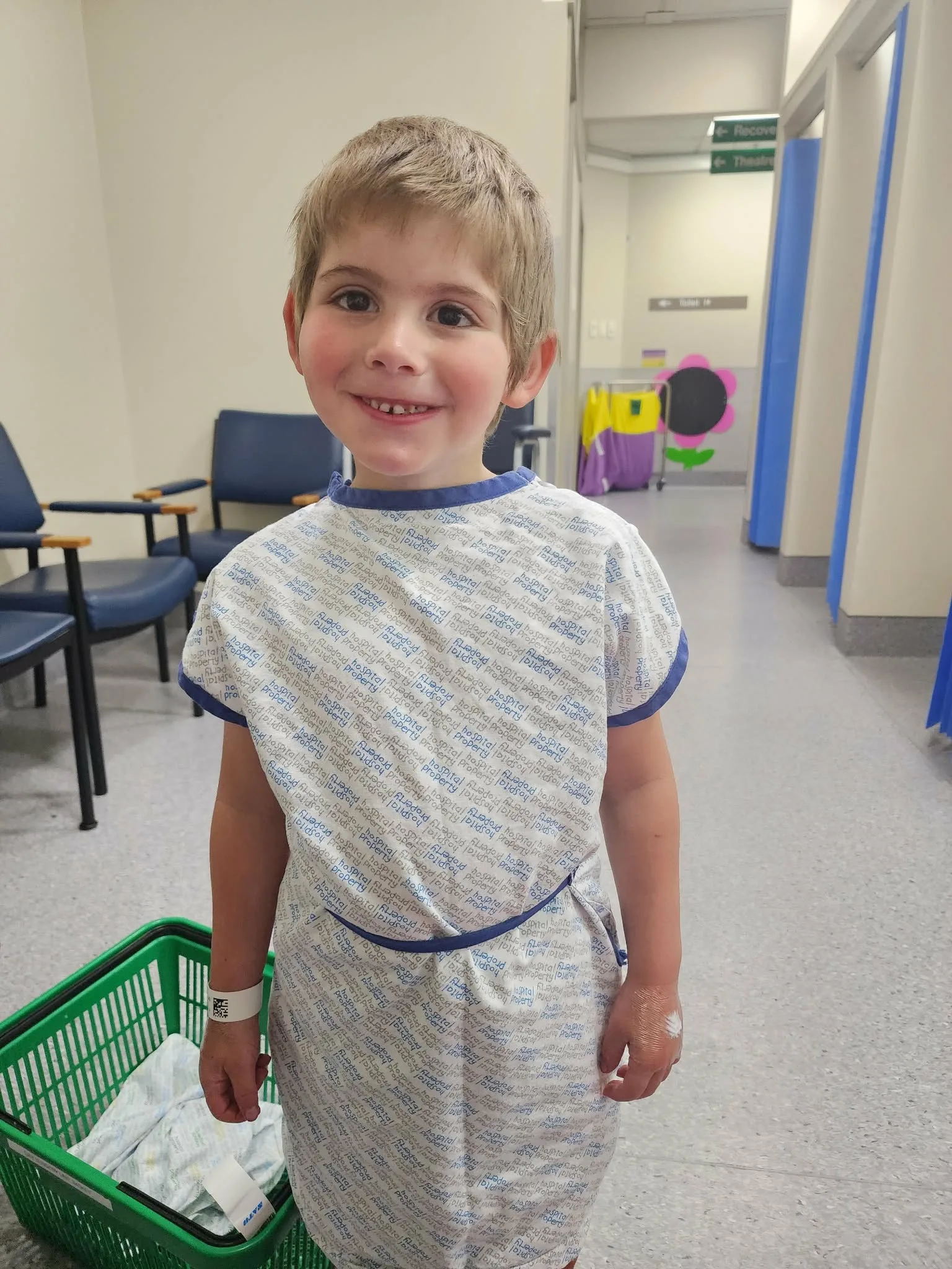 Image of boy dressed in hospital gown