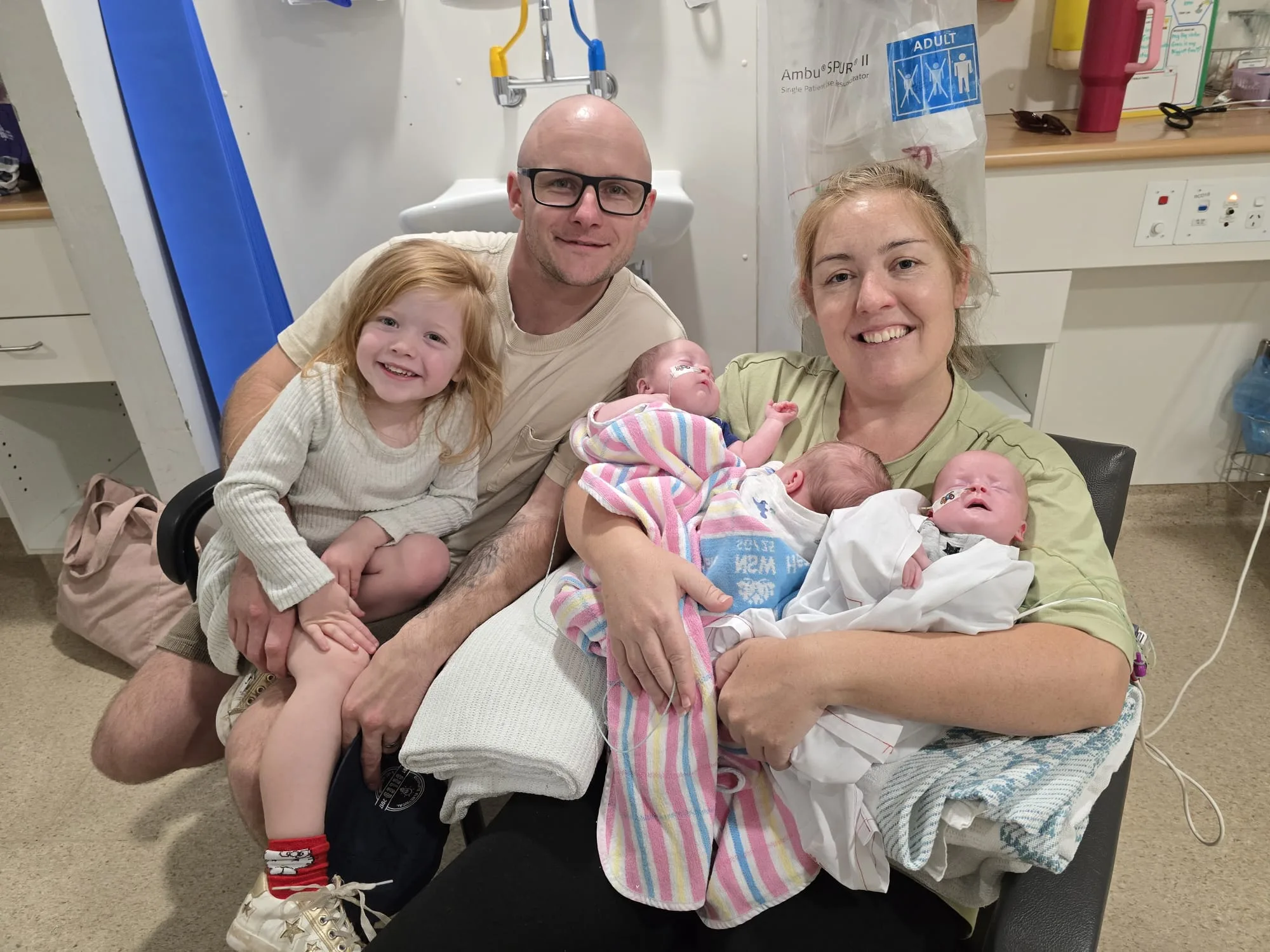 Image of mum and dad with four daughters