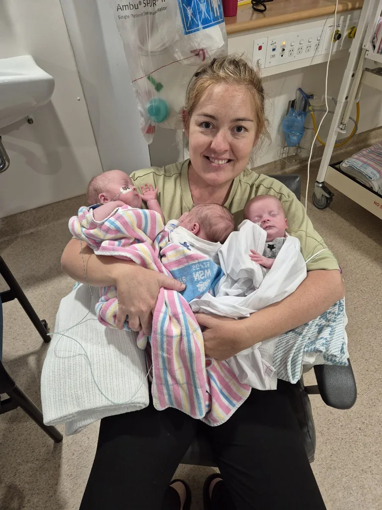 Image of Mum with triplets in hospital
