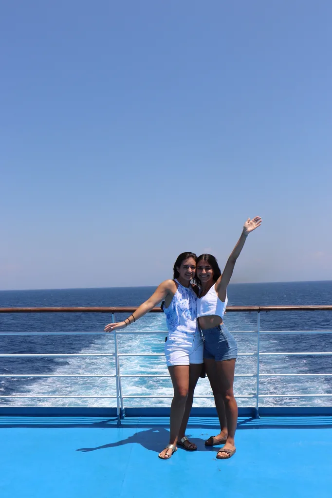 Image of two girls on a boat