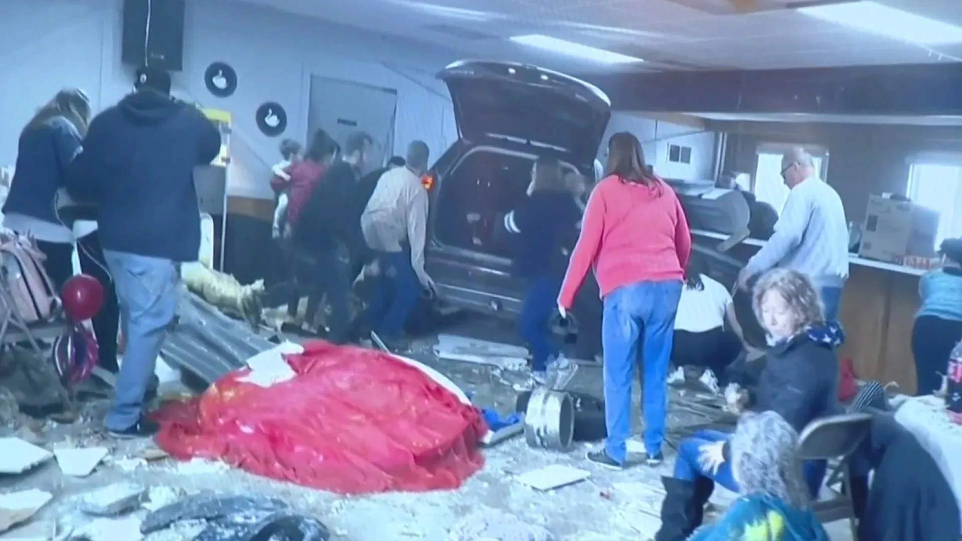 car surronded by debris and plaster