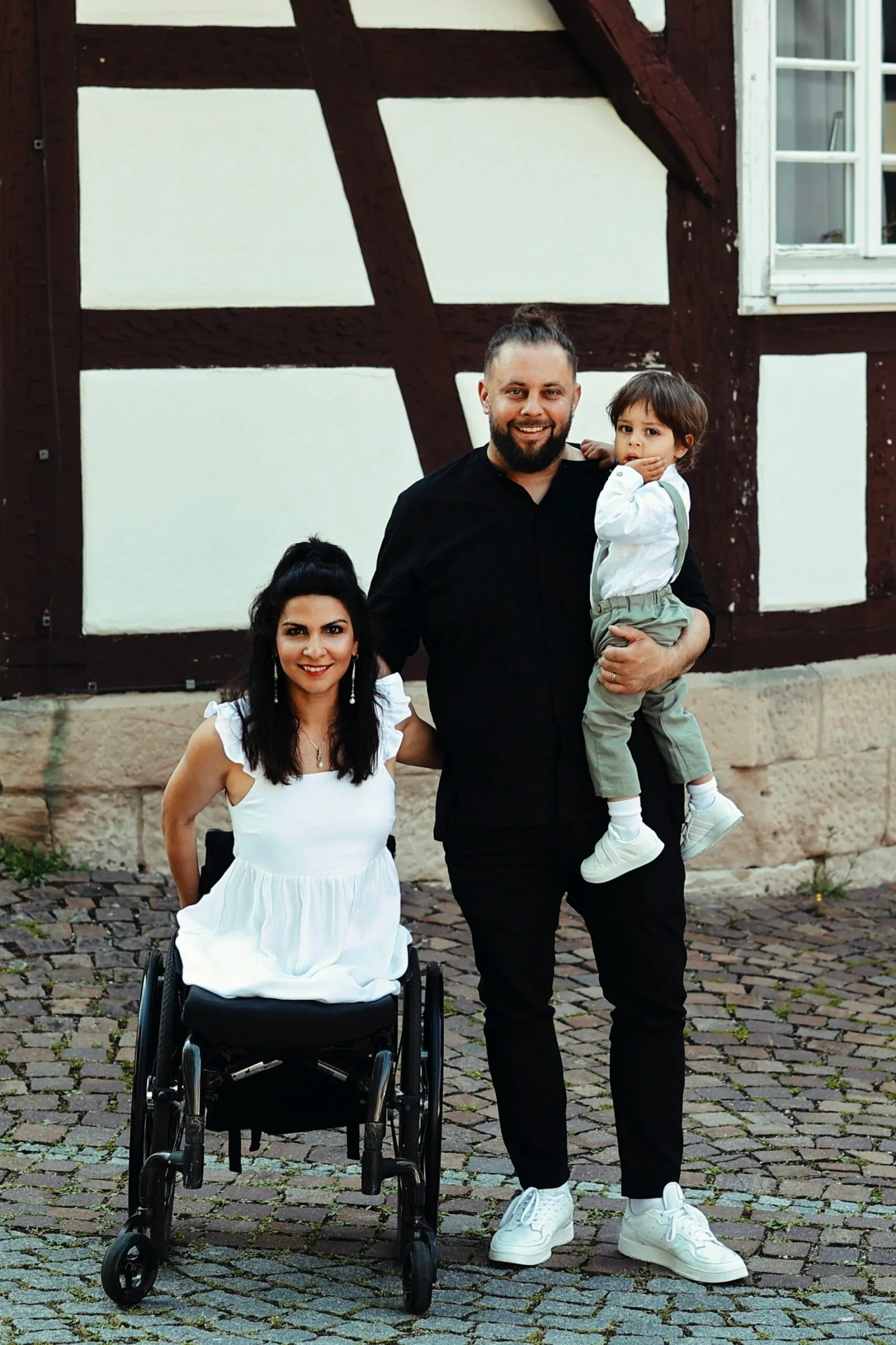 Image of disabled woman with her family