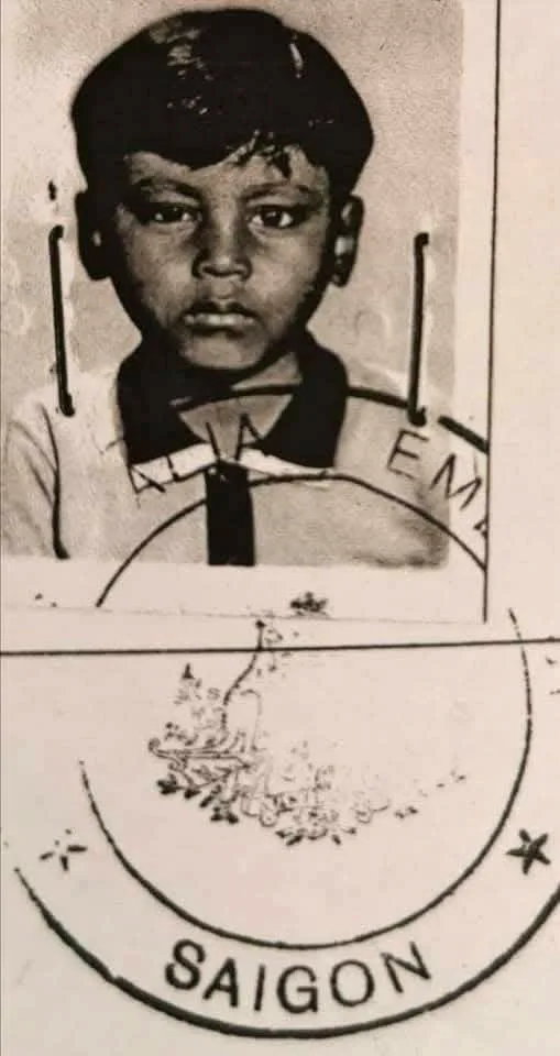 Passport picture of little boy.