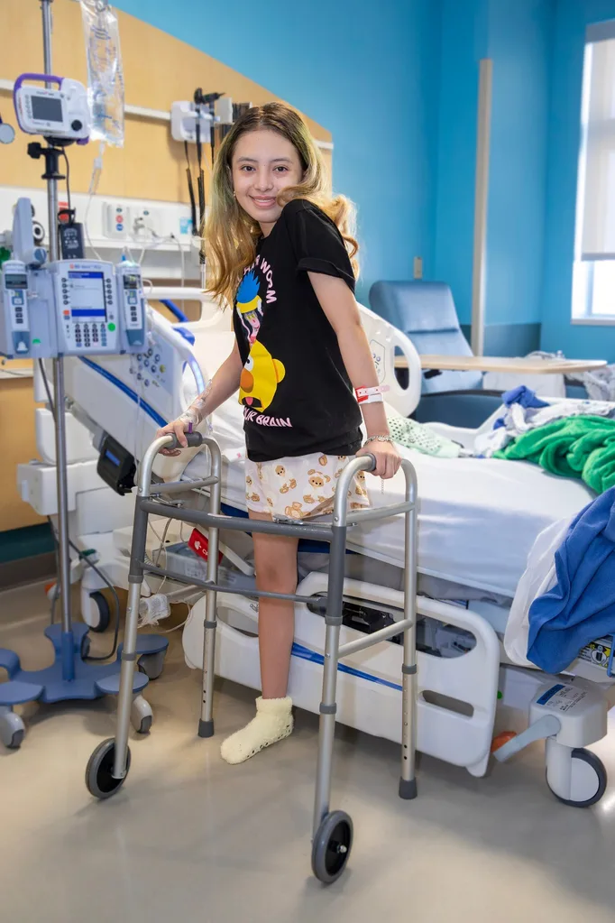 Image of girl following amputation surgery in hospital