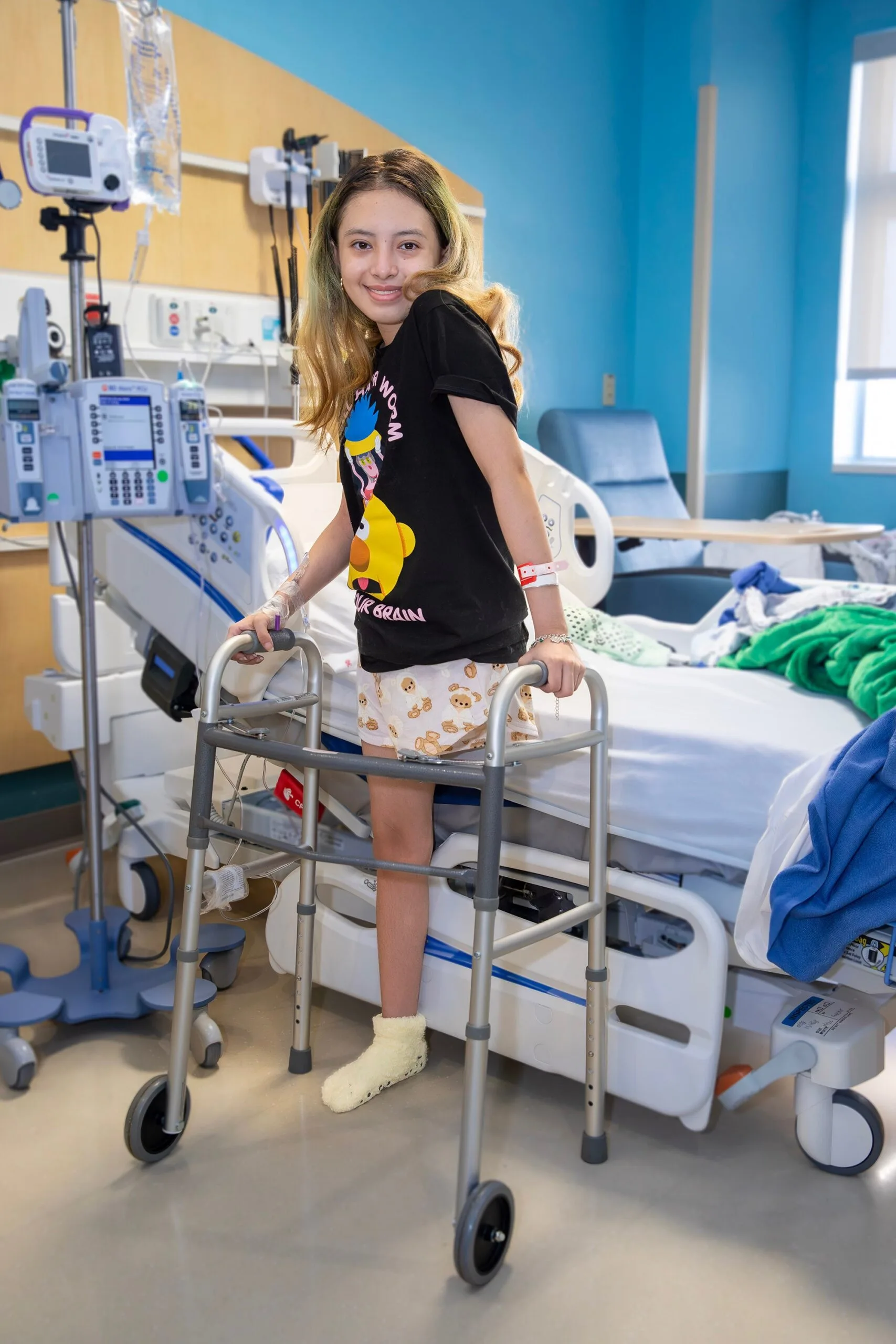 Image of girl following amputation surgery in hospital