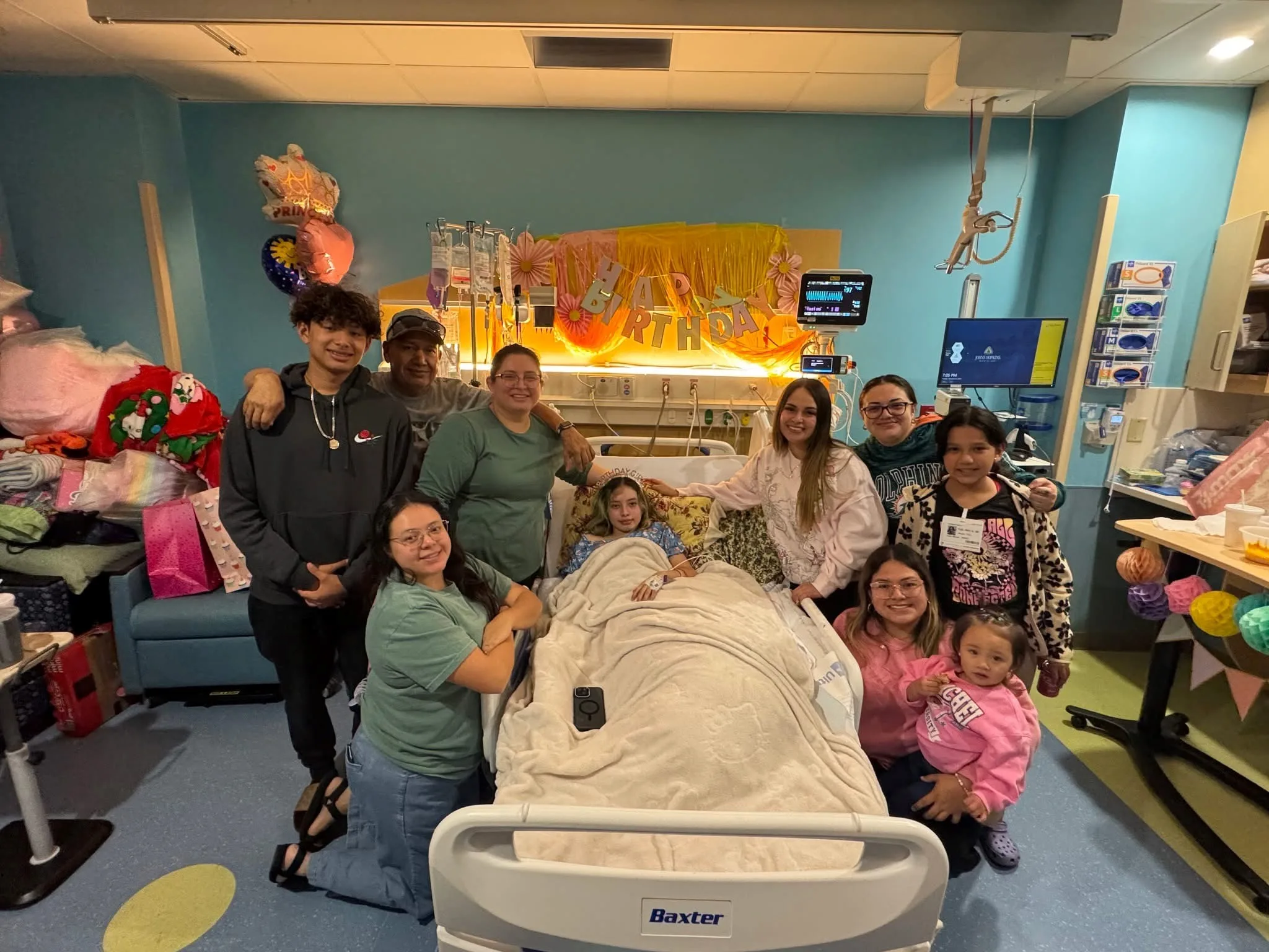 Image of family in hospital
