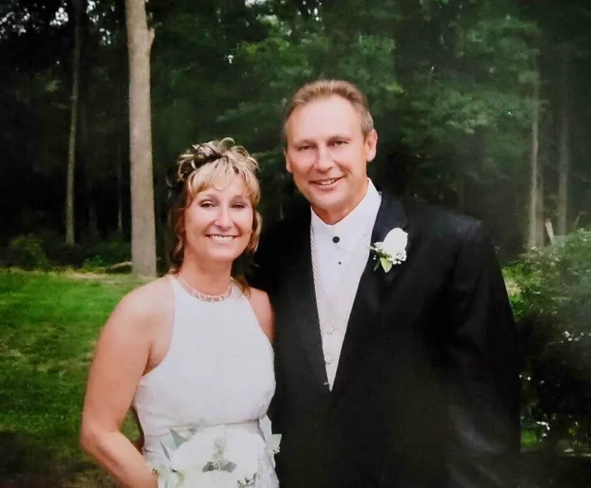 woman on her wedding day with sibling