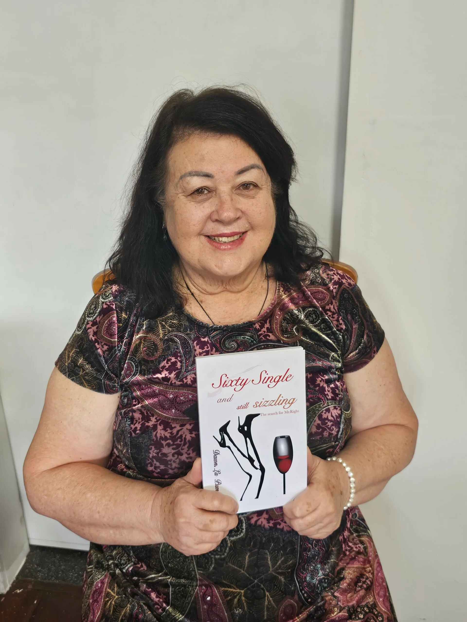 Dawn holding her book
