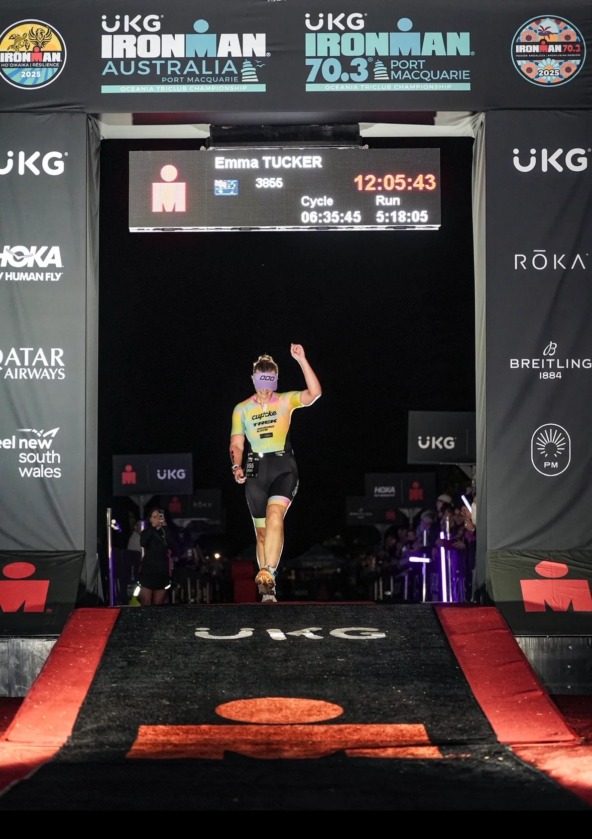 woman finishing ironman