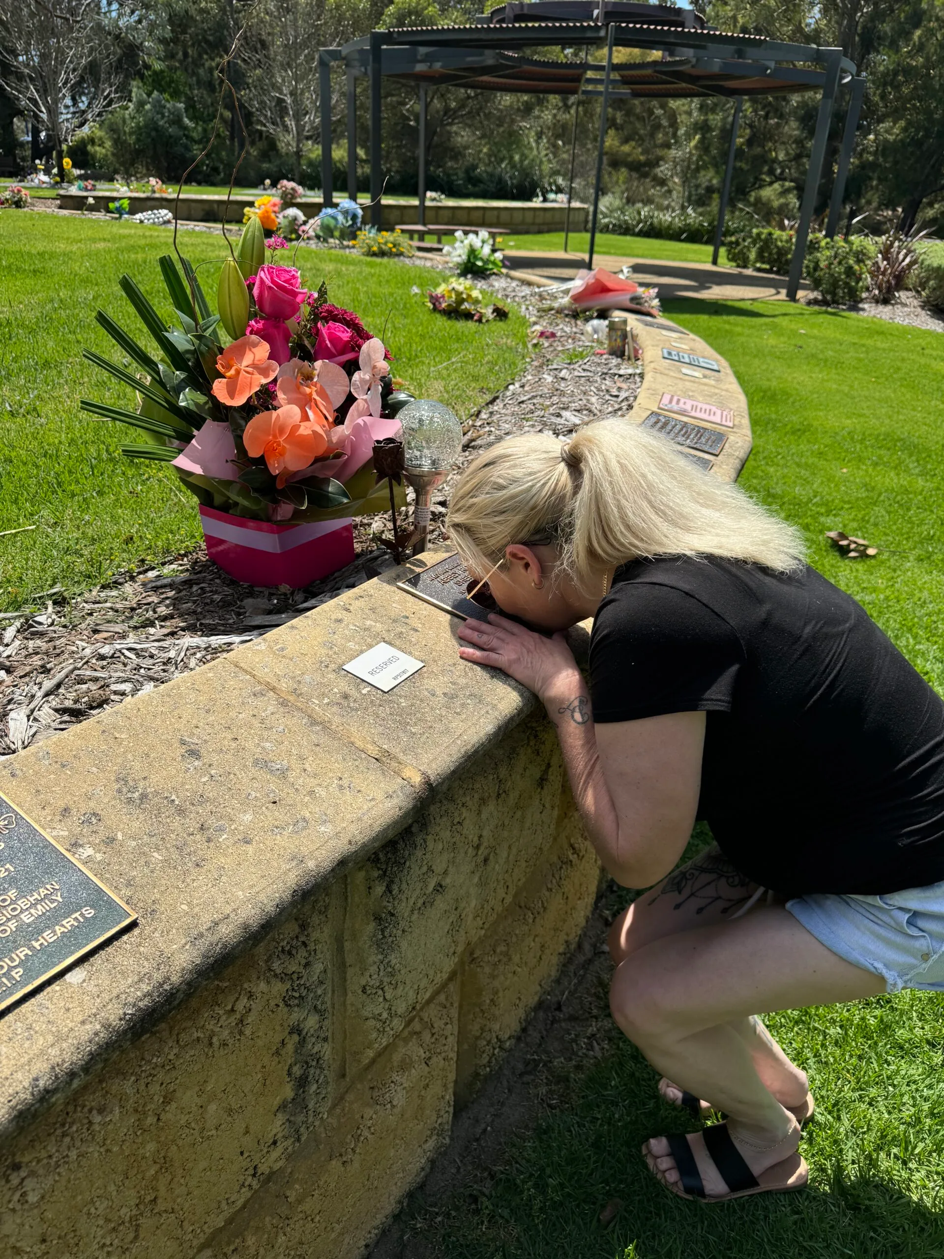 Julie at Abbey's grave