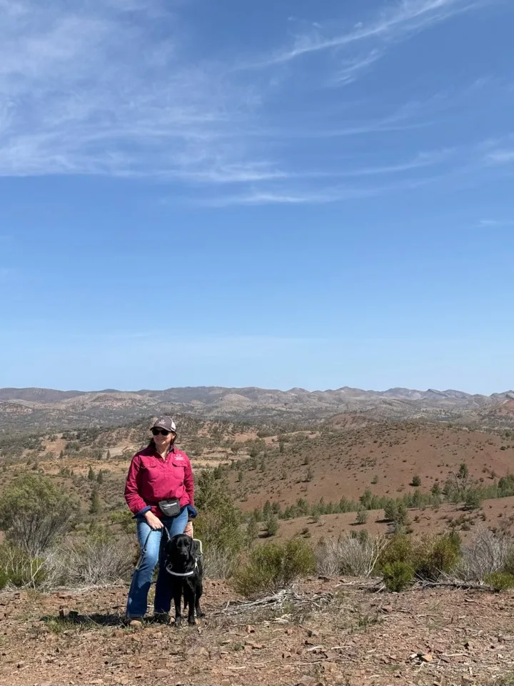 woman with dog on outback station