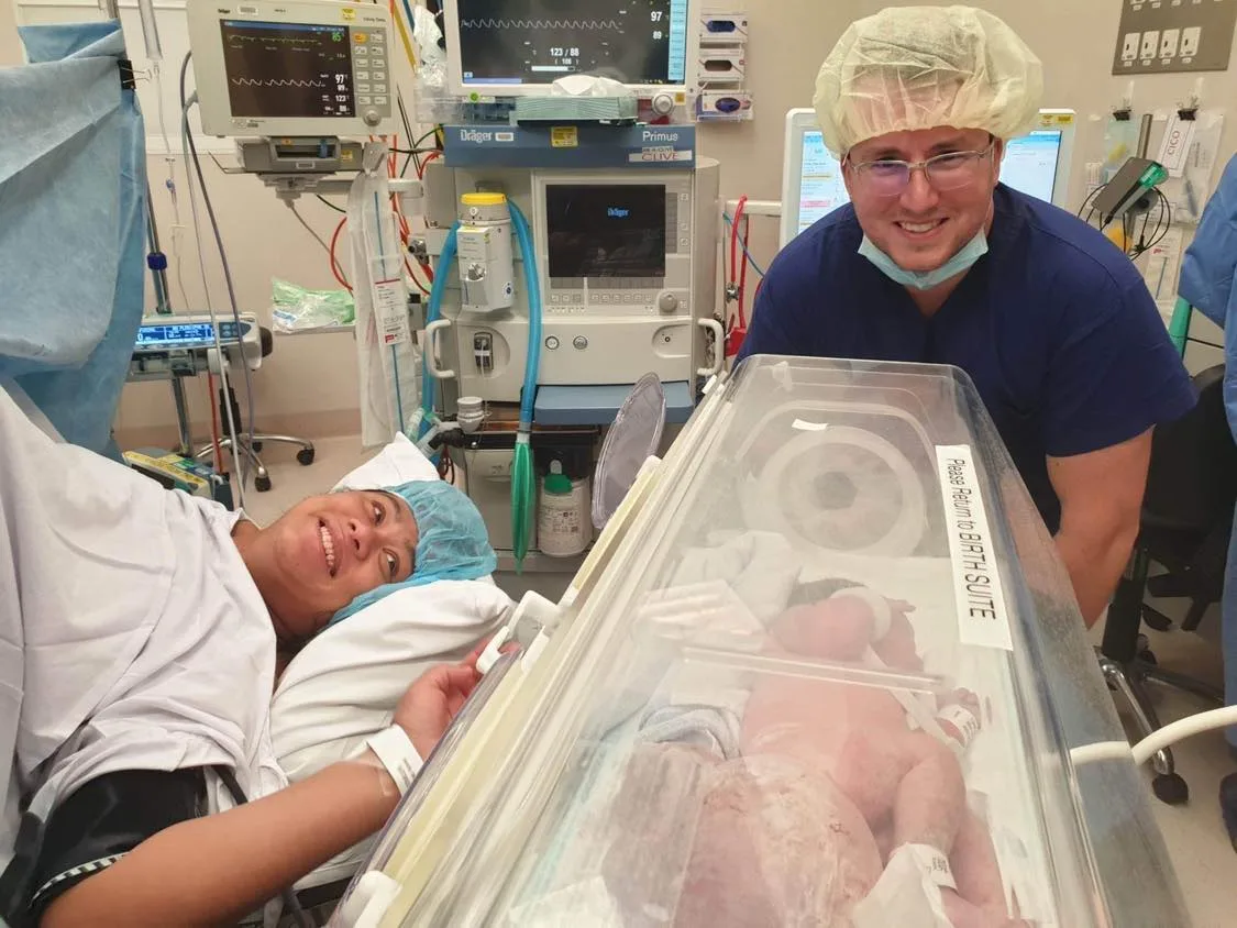 Image of parents and newborn at birth