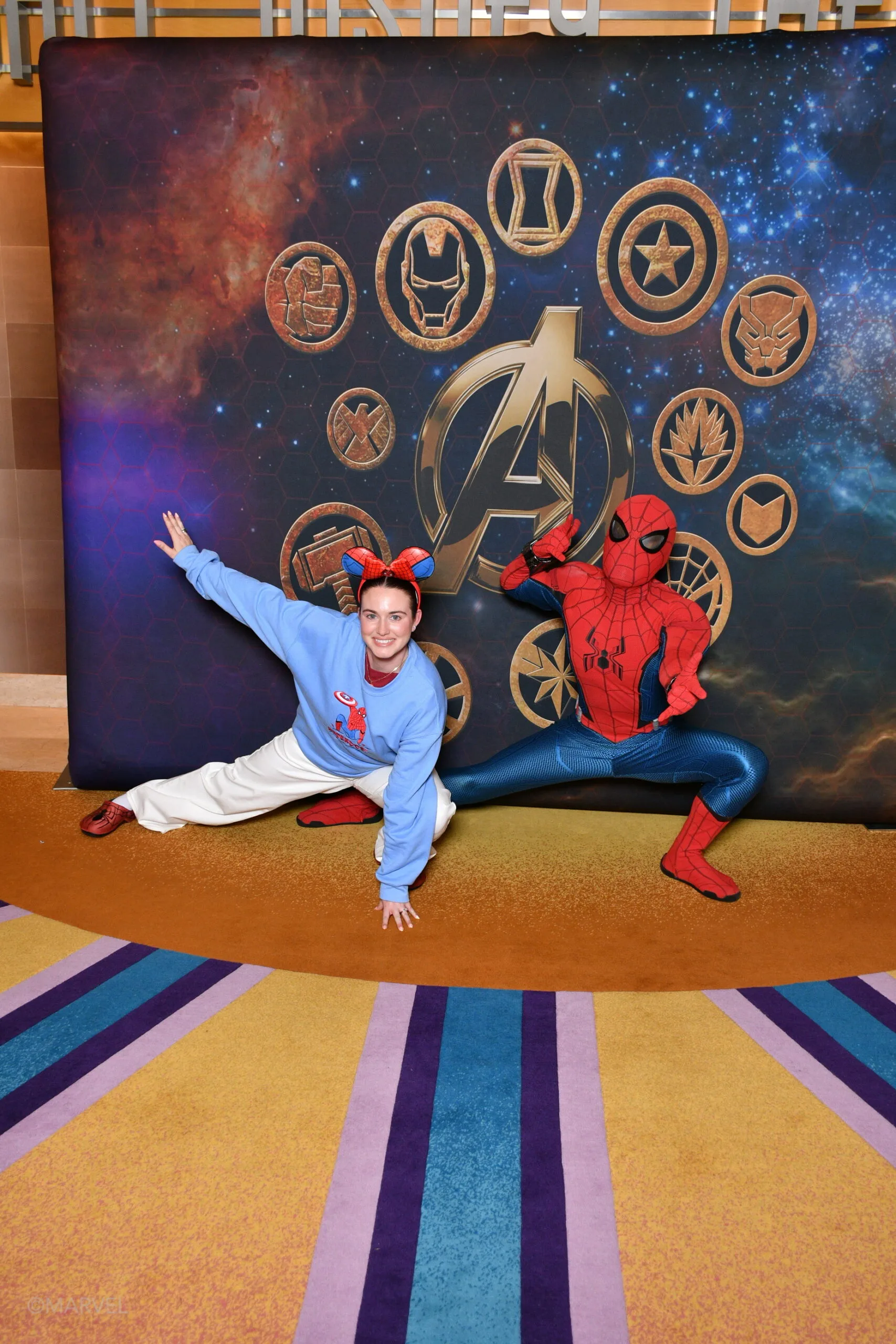 woman posing with spiderman