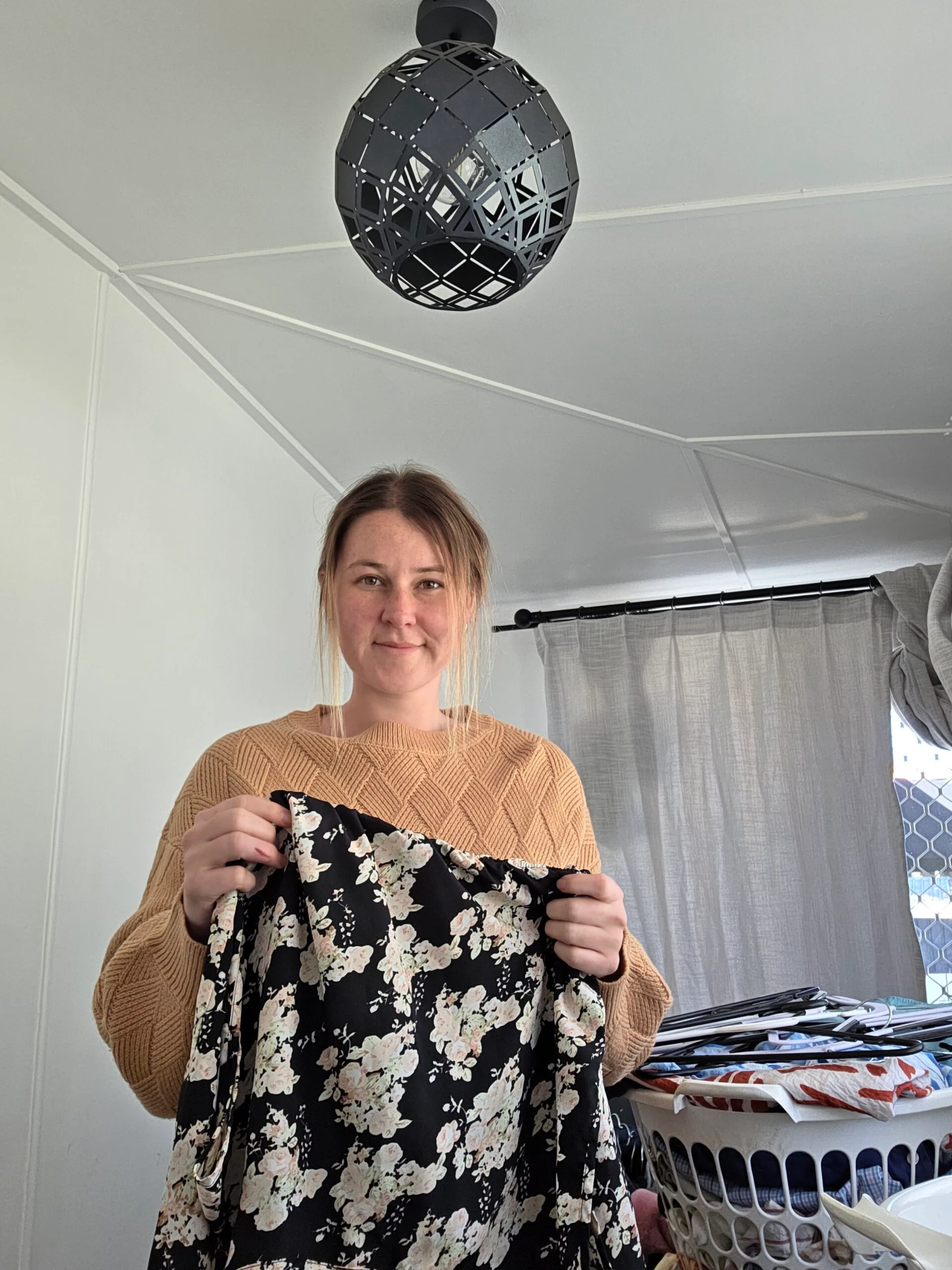woman folding clothes
