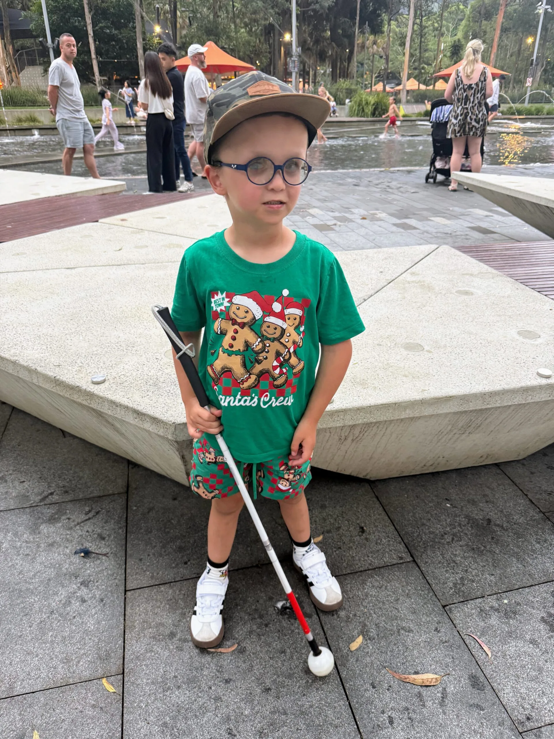 child with white cane