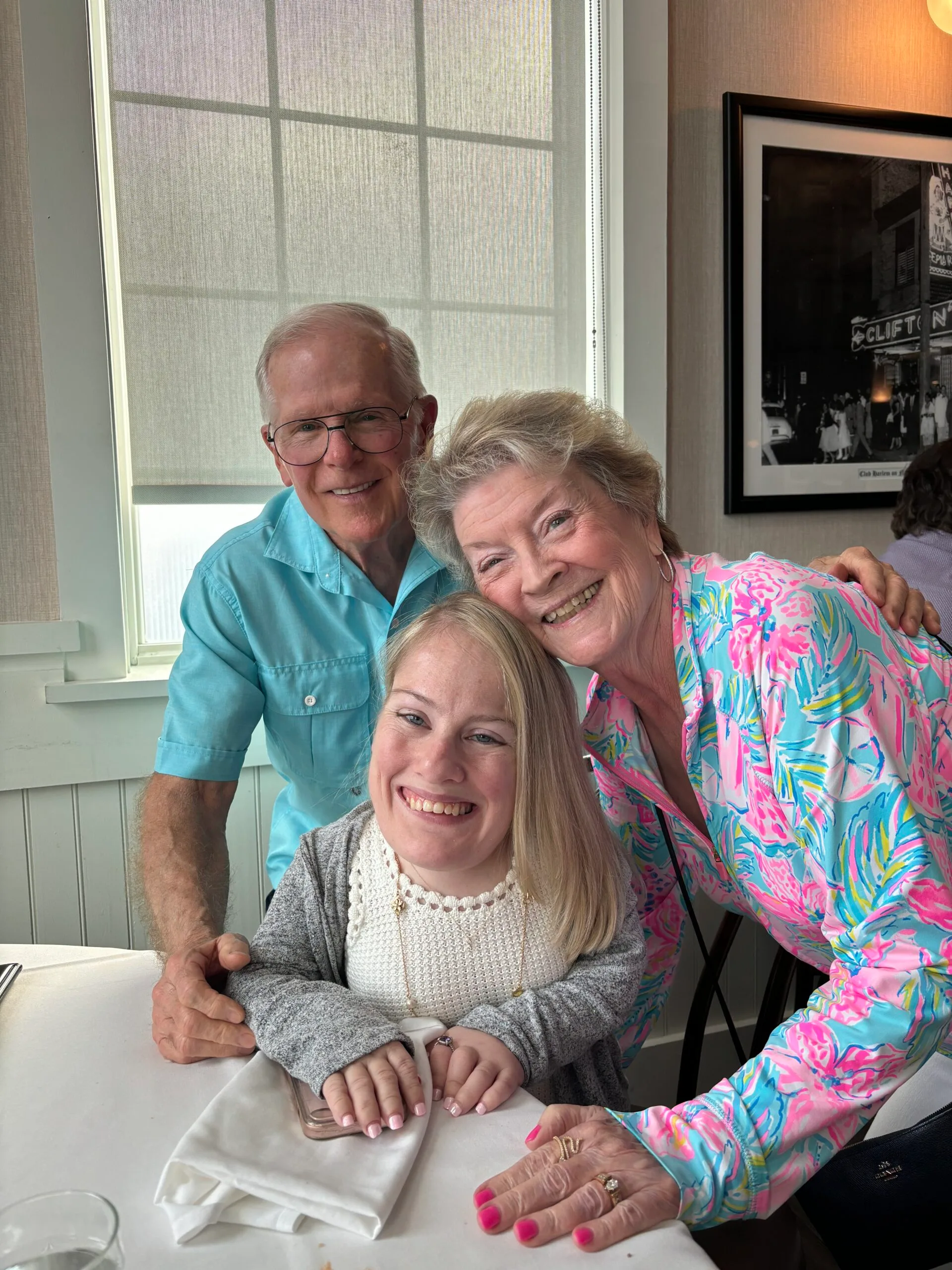 Image of grandparents and granddaughter