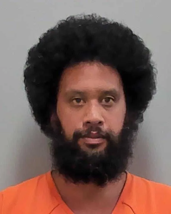 police mugshot of Keoki Hilo Demich