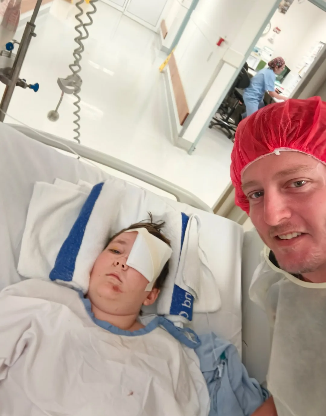 Image of father and son after accident