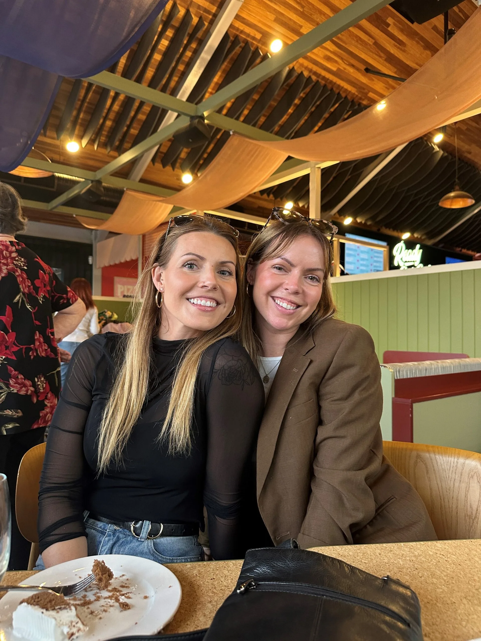 two girls sharing lunch 