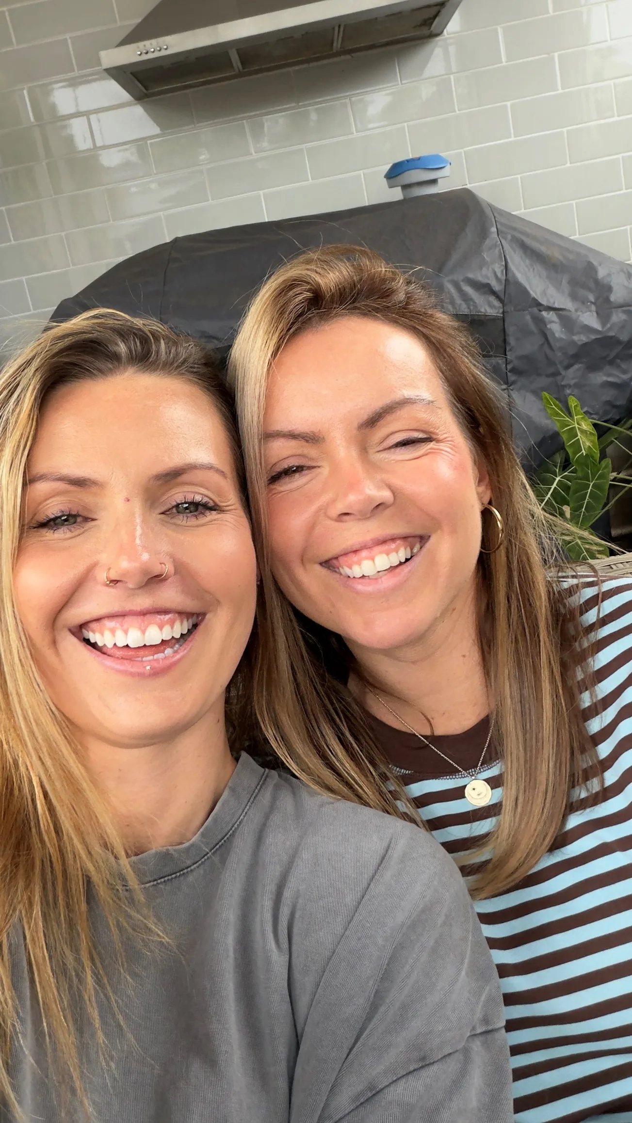 two girls taking a selfie 