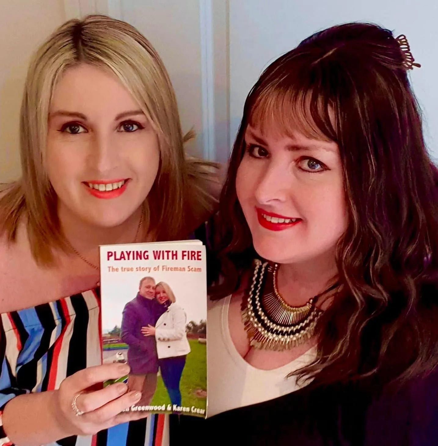 women holding their book