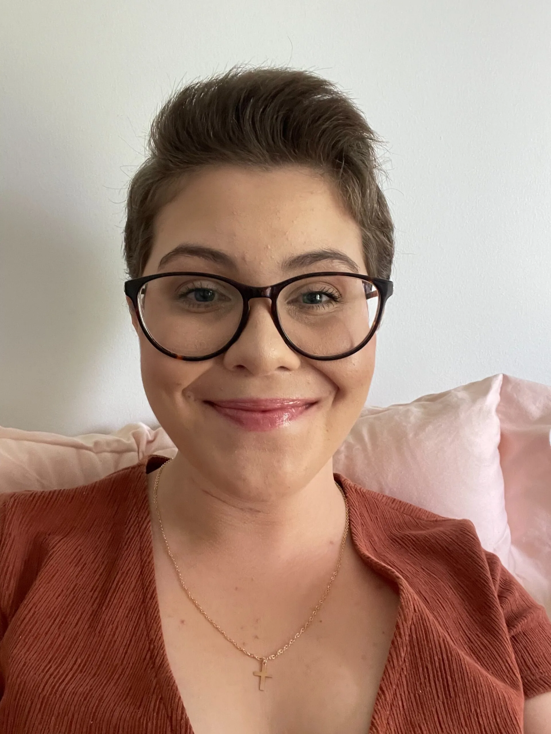 Image of woman smiling wearing glasses