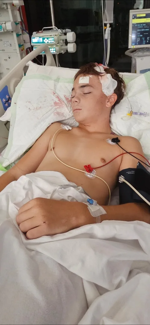 Image of young boy recovering in hospital