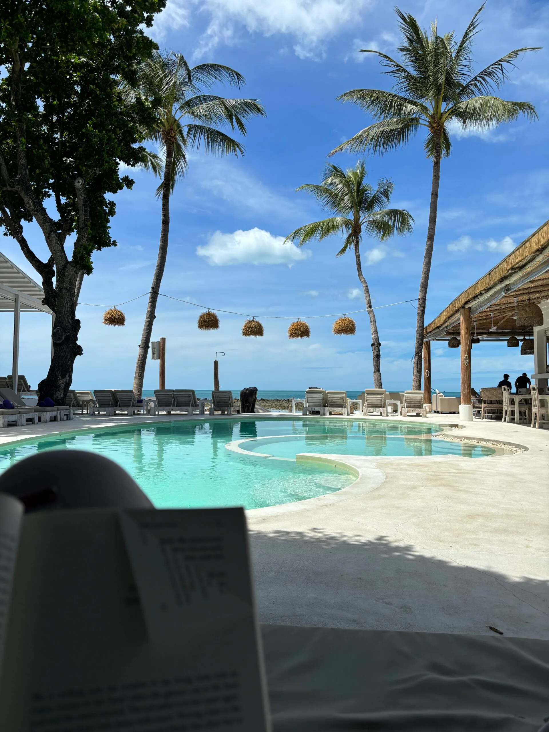 Pool and beach view at Elephant Beach club & resort in Koh Samui