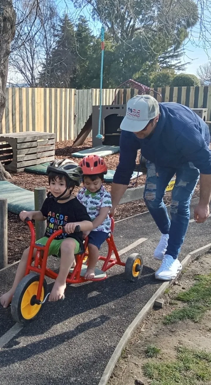 kids outside on bike