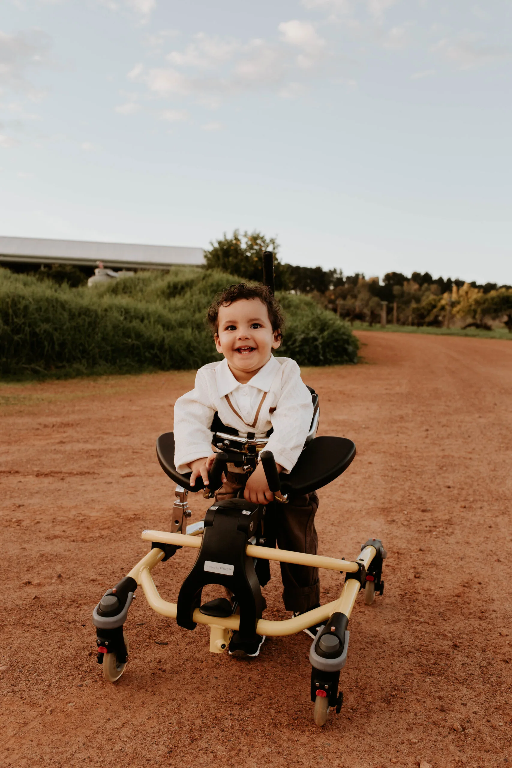 baby ali using his walking frame