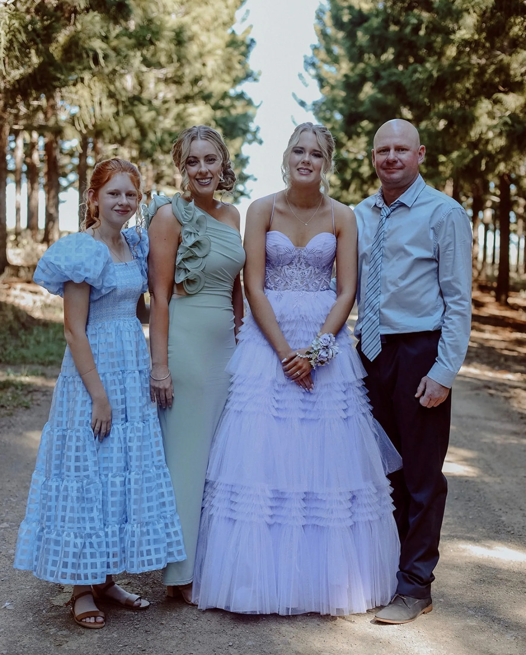 family dressed up for formal event