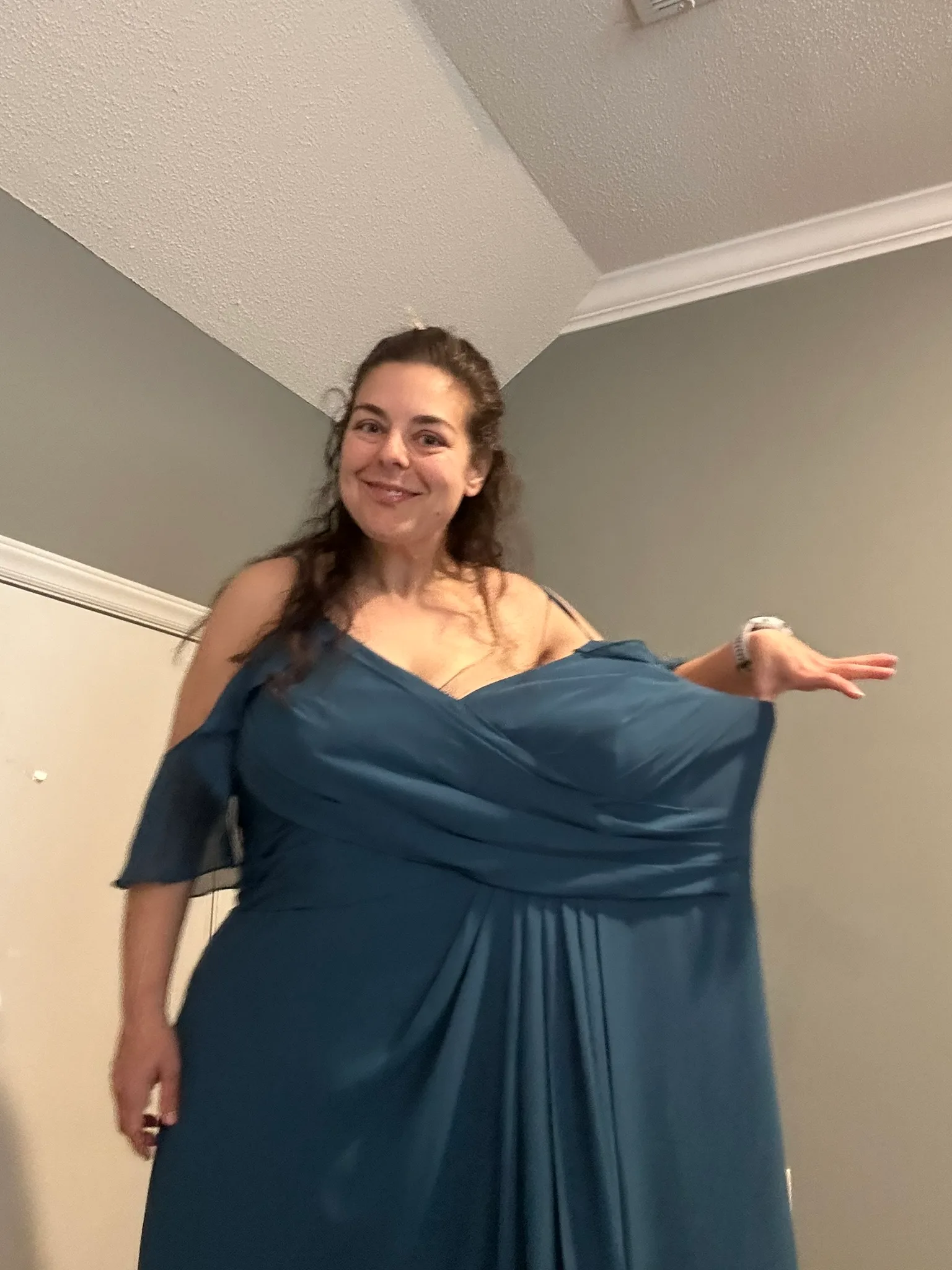 woman in oversized blue dress
