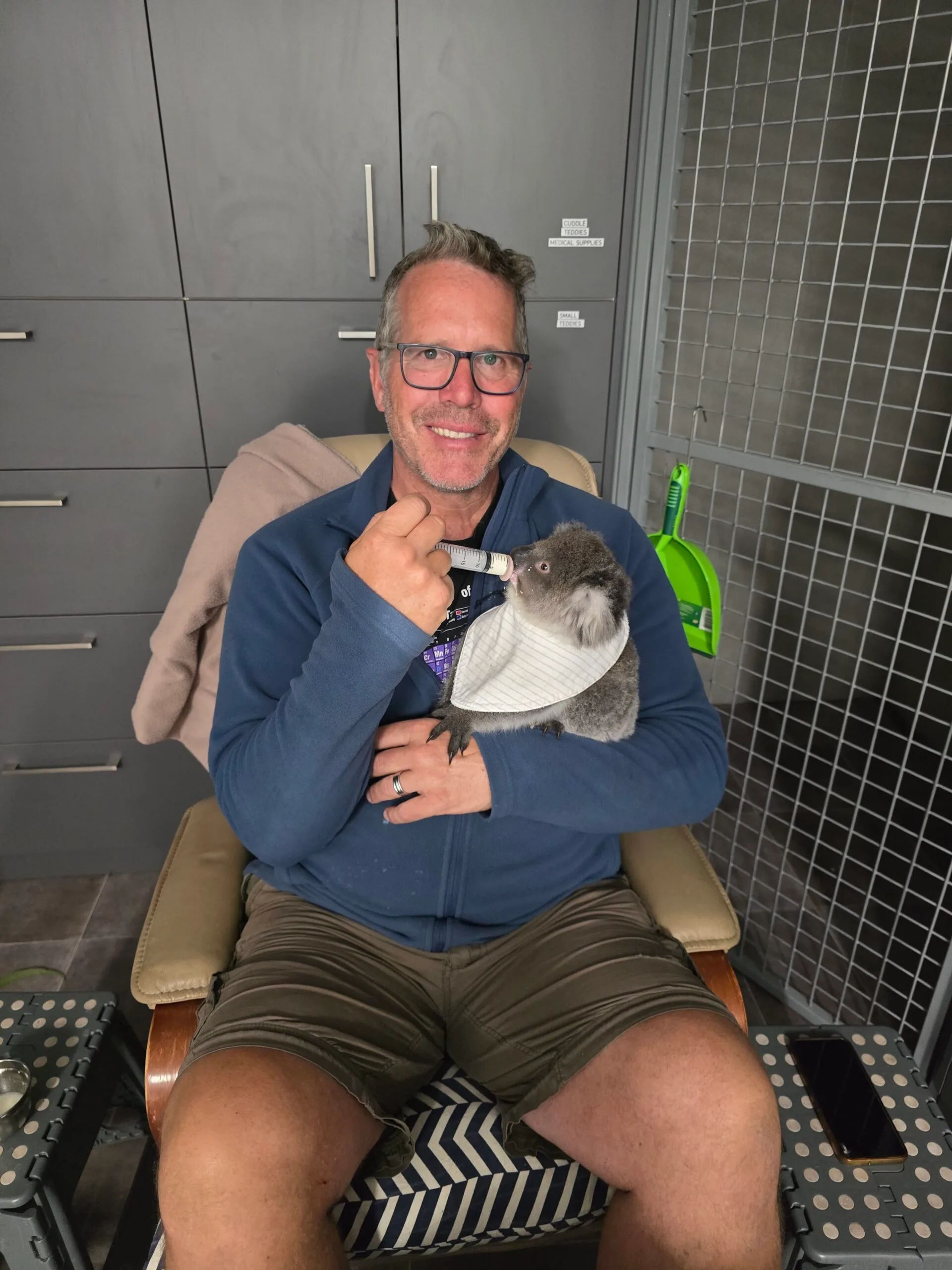 man holds rescue koala 