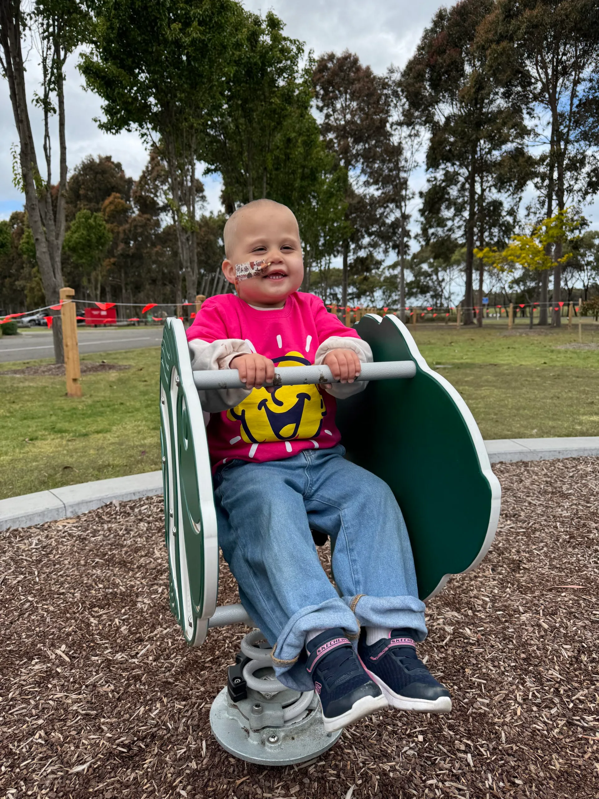 little girl on park ride 