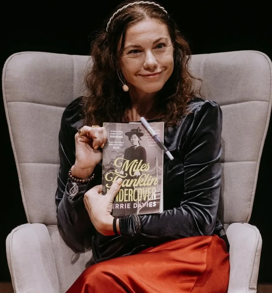 woman holding her book